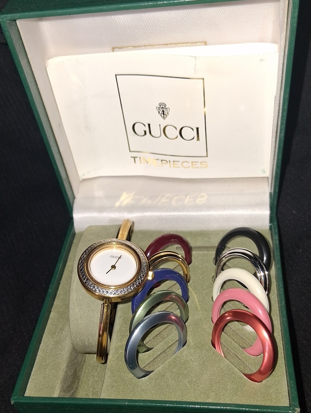 Gucci Gold Bangle Watch with Interchangeable Colored Bezels